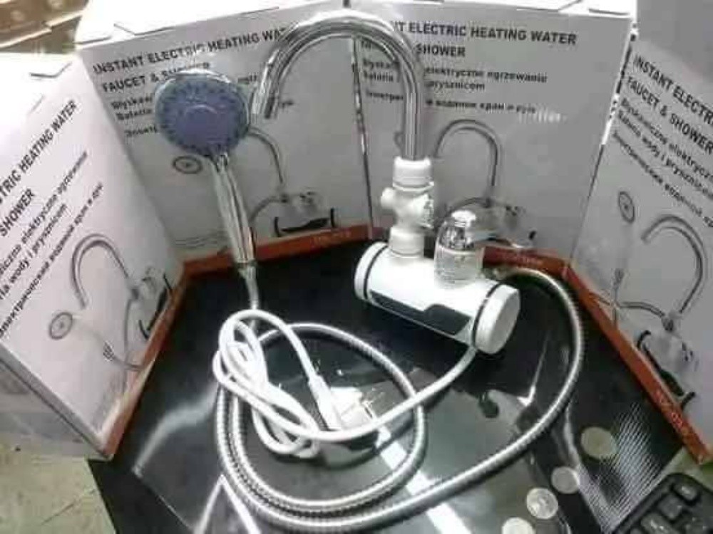 Water heating tap with sprinkler - 2