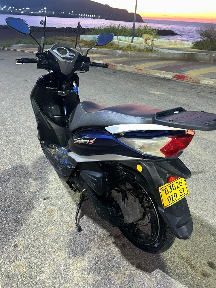 moto en vent  - 1