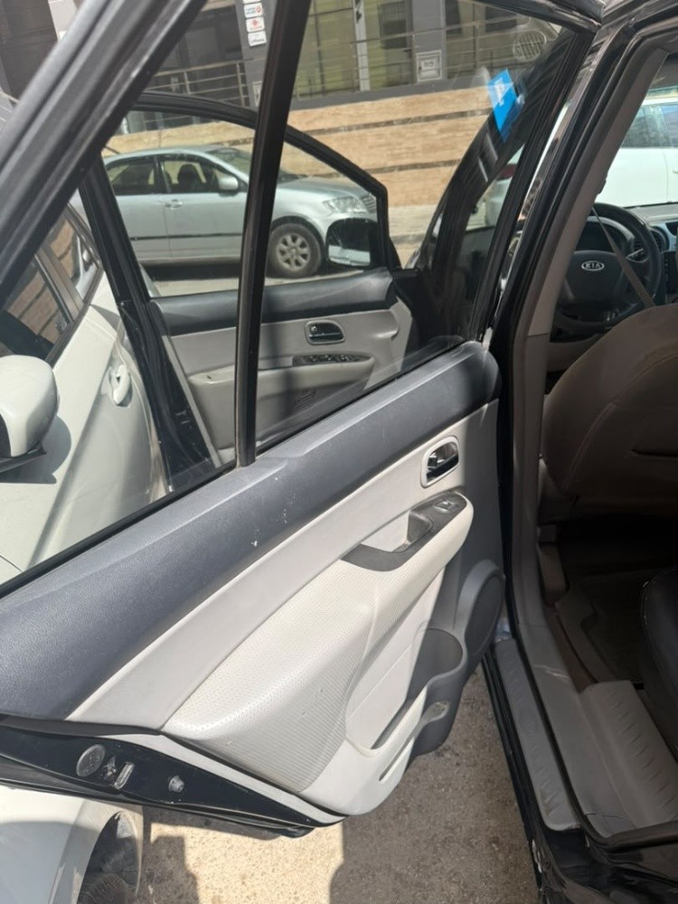 kia carens 3 2.0 hdi 110 - 13