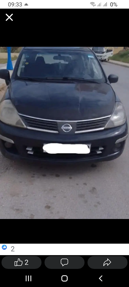 Nissan tida - 4