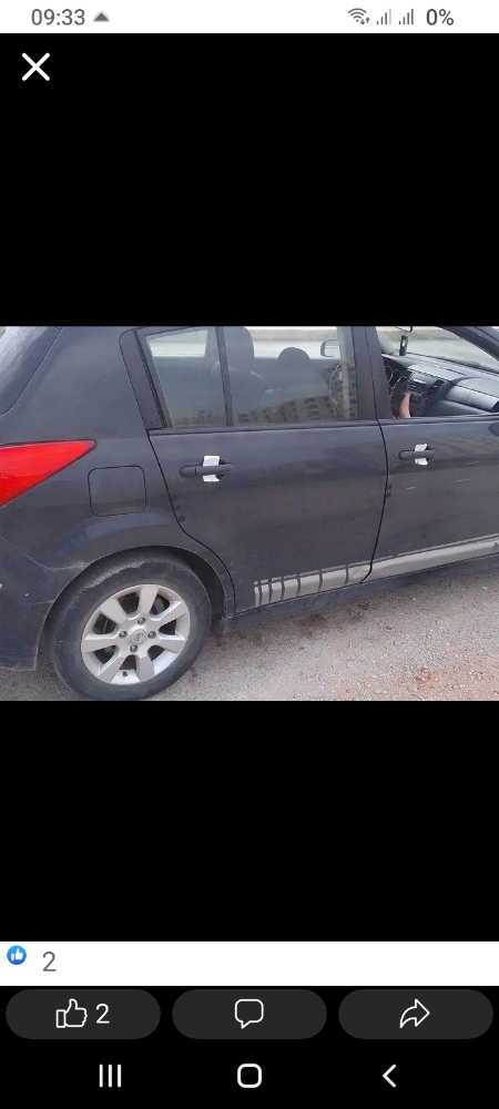 Nissan tida - 1