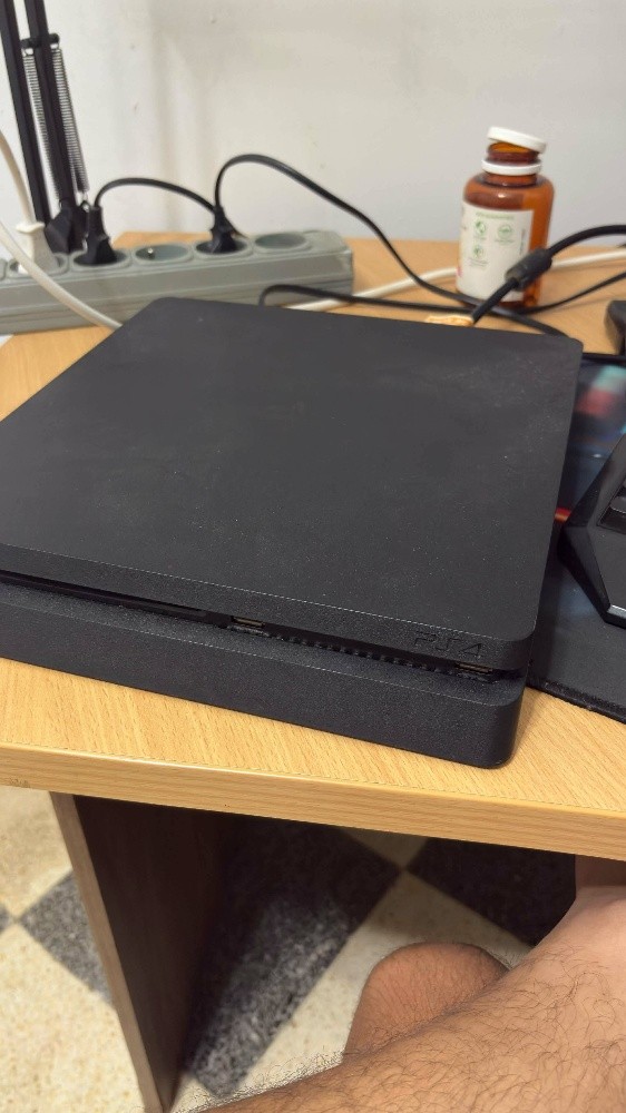 PlayStation 4 Slim, clean, and fl - 1
