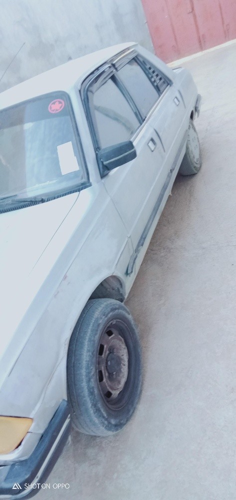 بيجو 305 - 4