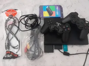 PS2 + 2 manette wahda sans fille