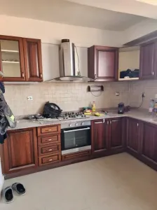 Cuisine équipée en bois acajou +
